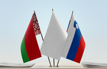 Flags of Belarus and Slovenia with a white flag in the middle