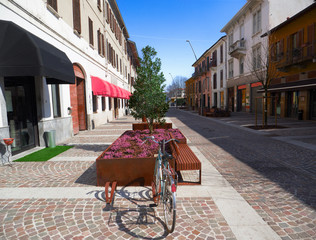 pedestrian area in the city center, with benches, flowerbeds and bicycle parking