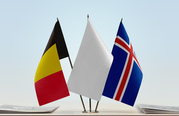 Flags of Belgium and Iceland with a white flag in the middle