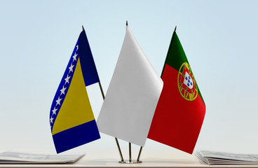 Flags of Bosnia and Herzegovina and Portugal with a white flag in the middle