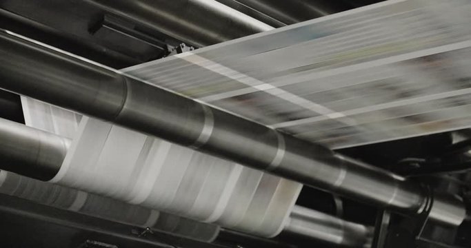 Tomorrow's newspapers are printed on a high speed printing press.