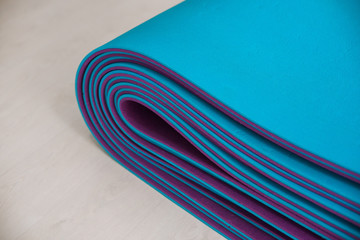 Bright blue and violet yoga mats