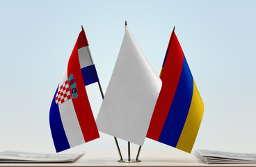 Flags of Croatia and Armenia with a white flag in the middle