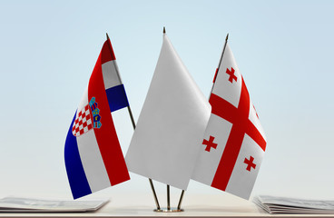Flags of Croatia and Georgia with a white flag in the middle