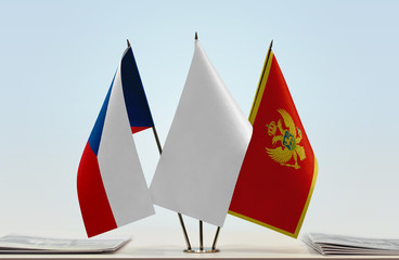 Flags of Czech Republic and Montenegro with a white flag in the middle