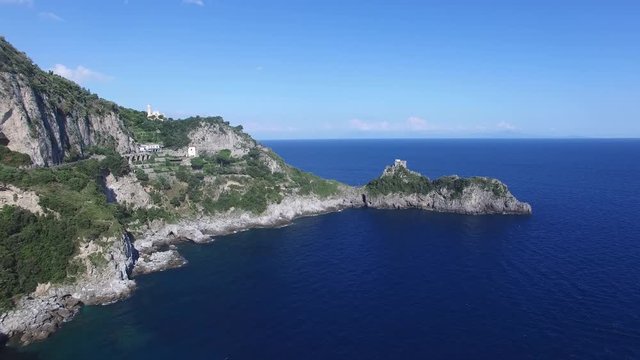Aerial view. Picturesque rock near the Marina di Minturno town. Italy. 4K