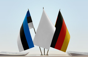 Flags of Estonia and Germany with a white flag in the middle
