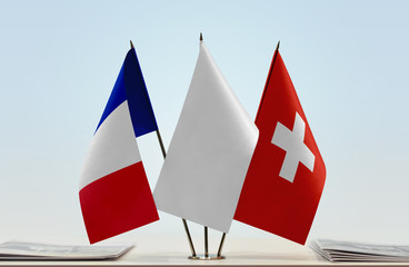 Flags of France and Switzerland with a white flag in the middle