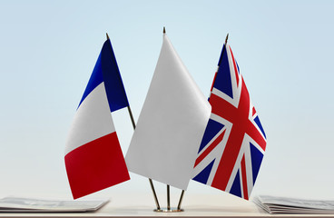 Flags of France and Great Britain with a white flag in the middle