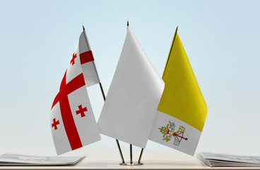 Flags of Georgia (country) and Vatican City with a white flag in the middle