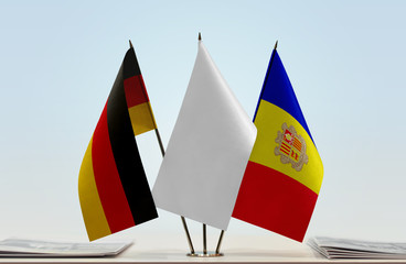 Flags of Germany and Andorra with a white flag in the middle