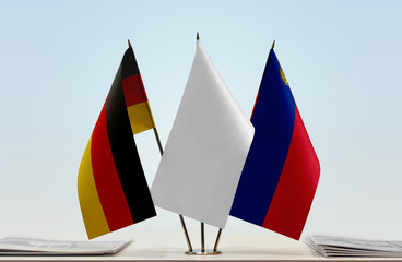 Flags of Germany and Liechtenstein with a white flag in the middle