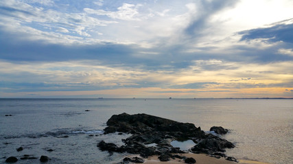 Landscape of beach with sky with clouds in the late afternoon