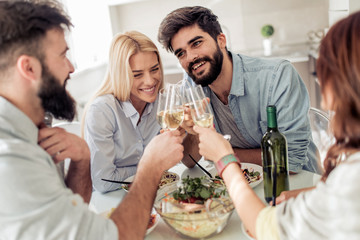 Friends having lunch at home