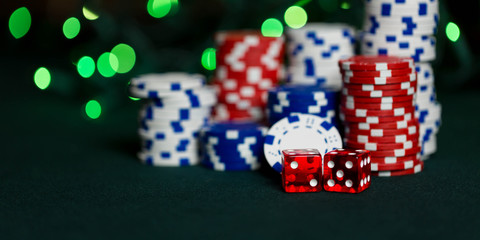 Stacks of poker chips representing a gambling win at a casino or poker or craps game.