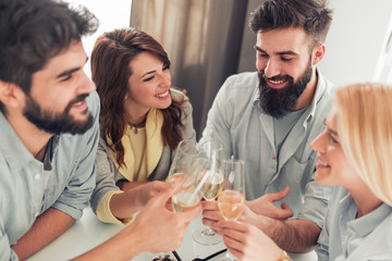 Group of friends celebrating birthday at home