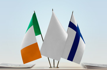 Flags of Ireland and Finland with a white flag in the middle