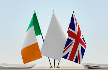 Flags of Ireland and Great Britain with a white flag in the middle