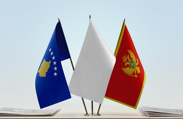 Flags of Kosovo and Montenegro with a white flag in the middle