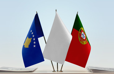 Flags of Kosovo and Portugal with a white flag in the middle