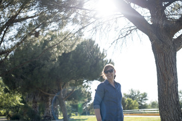 Fototapeta premium Grandmother posing in the park