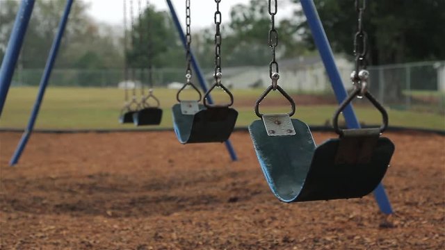 Empty Swings on Playground