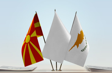 Flags of Macedonia (FYROM) and Cyprus with a white flag in the middle