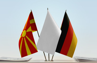 Flags of Macedonia (FYROM) and Germany with a white flag in the middle