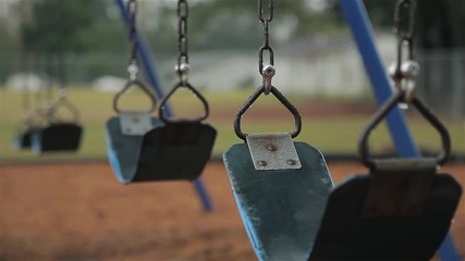 Empty Swings on Playground