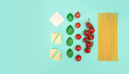 Italian pasta with tomatoes, grated parmesan and basil.