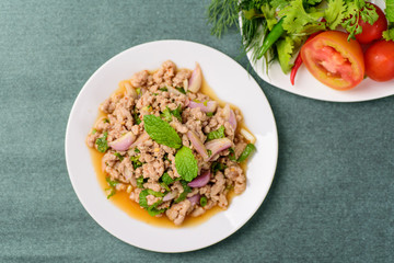 Thai food, spicy minced pork salad (Larb Moo), top view