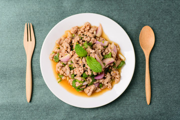 Thai food, spicy minced pork salad (Larb Moo), top view