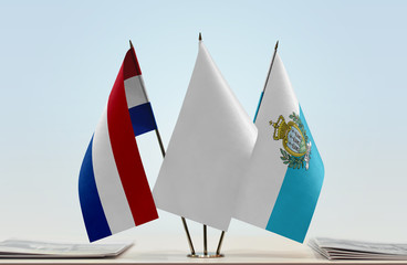 Flags of Netherlands and San Marino with a white flag in the middle