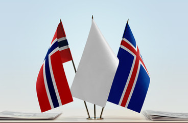 Fototapeta na wymiar Flags of Norway and Iceland with a white flag in the middle