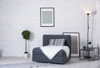 Beautiful room interior with comfortable sofa