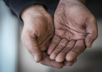 Poor man begging for money, closeup