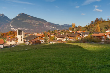 Autumn view of near Lake Thun and typical Switzerland village near town of Interlaken, canton of Bern