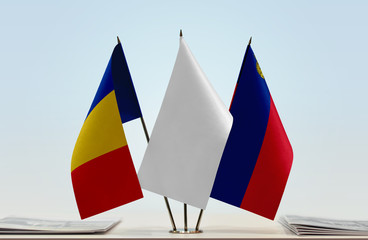 Flags of Romania and Liechtenstein with a white flag in the middle