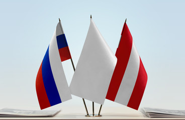 Flags of Russia and Austria with a white flag in the middle