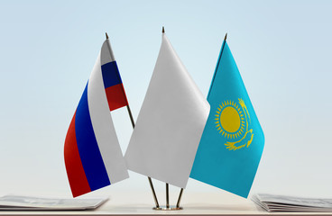 Flags of Russia and Kazakhstan with a white flag in the middle