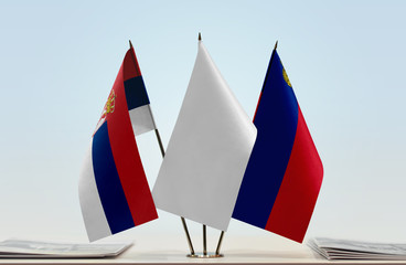 Flags of Serbia and Liechtenstein with a white flag in the middle