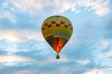 Fototapeta premium Hot air balloon in flight. It is a type of aircraft that can lifted by heating the air inside the balloon, usually with fire.