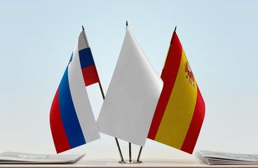 Flags of Slovenia and Spain with a white flag in the middle