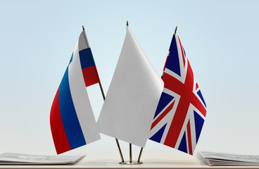 Flags of Slovenia and Great Britain with a white flag in the middle