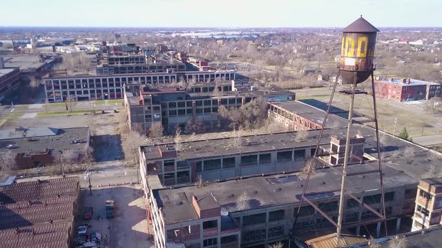 Amazing aerial over the ruined and abandoned Packard automobile factory near Detroit Michigan.