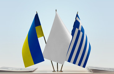 Flags of Ukraine and Greece with a white flag in the middle