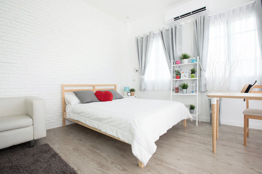 King-size bed in bright bedroom