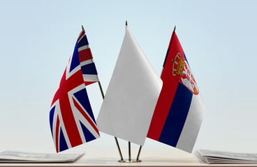 Flags of Great Britain and Serbia with a white flag in the middle