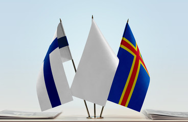 Flags of Finland and Aland with a white flag in the middle