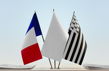 Flags of France and Brittany with a white flag in the middle